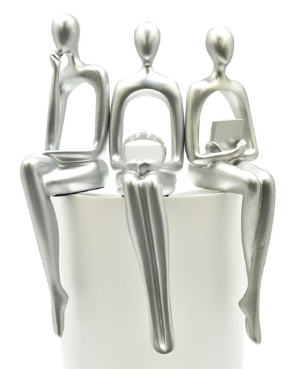 Set of Three Silver Resin People Tabletop Sculpture