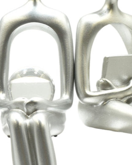 Set of Three Silver Resin People Tabletop Sculpture