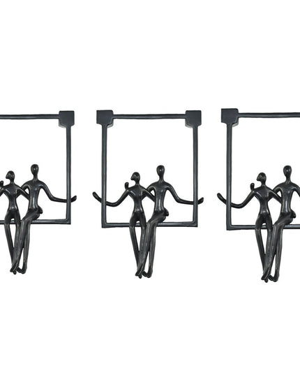 Set of Three Black Resin People Tabletop Sculpture