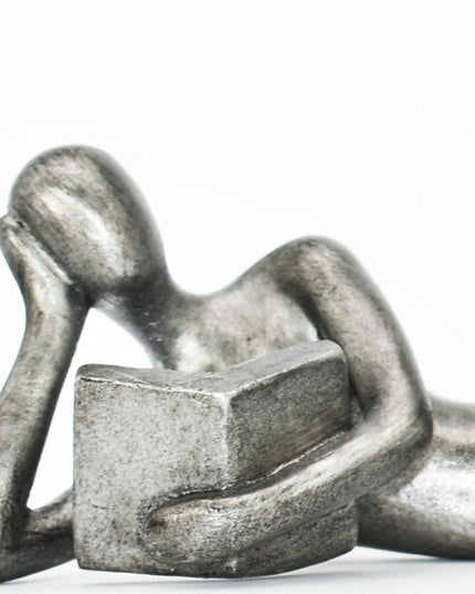 Set of Two Pewter Resin People Tabletop Sculpture