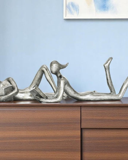 Set of Two Pewter Resin People Tabletop Sculpture