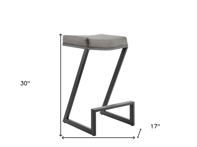 30" Gray and Black Faux Leather and Iron Backless Bar Height Bar Chair