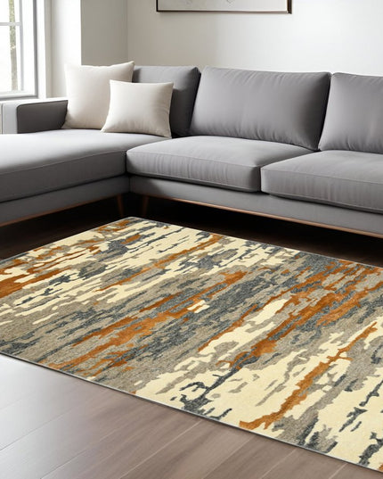 9' X 13' Orange Ivory And Green Wool Abstract Hand Tufted Area Rug