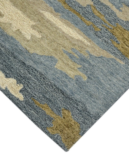 9' X 13' Light Blue Ivory And Brown Wool Abstract Hand Tufted Area Rug