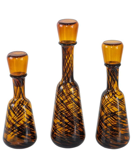 Set of Three Amber Abstract Swirl Glass Decorative Bottles With Stoppers