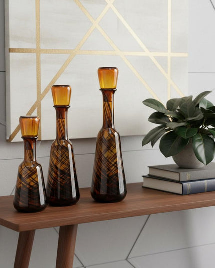 Set of Three Amber Abstract Swirl Glass Decorative Bottles With Stoppers