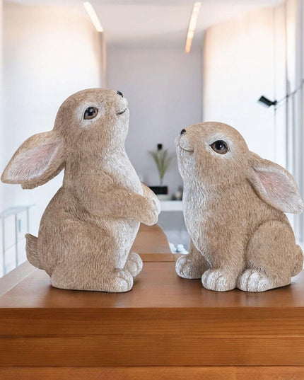 Set of Four Beige Polyresin Figurine Tabletop Sculpture