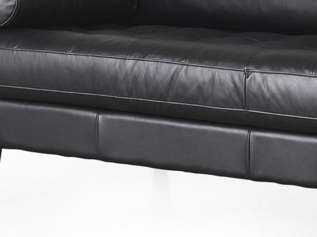 88" Black Leather Sofa And Toss Pillows With Brown Legs