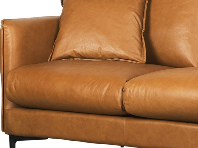 86" Tan Leather Sofa And Toss Pillows With Black Legs