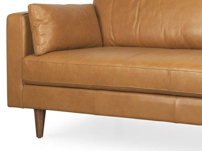 88" Tan Leather Sofa And Toss Pillows With Brown Legs