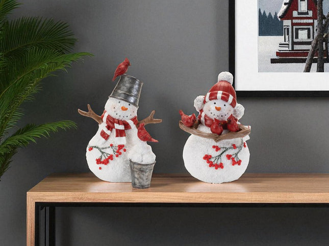 Set of Two White Red And Silver Polyresin Christmas Snowman Figurine