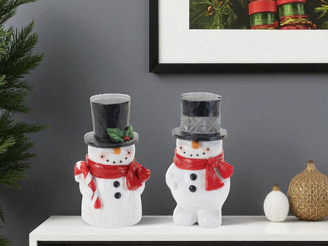 Set of Two White Red And Silver Polyresin Christmas Snowman Figurine