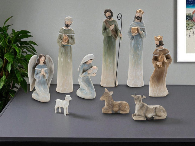 Set of Nine Beige And Gold Polyresin Figurine