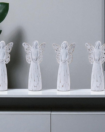 Set of Four White Polyresin Floral Wing Angel Figurines