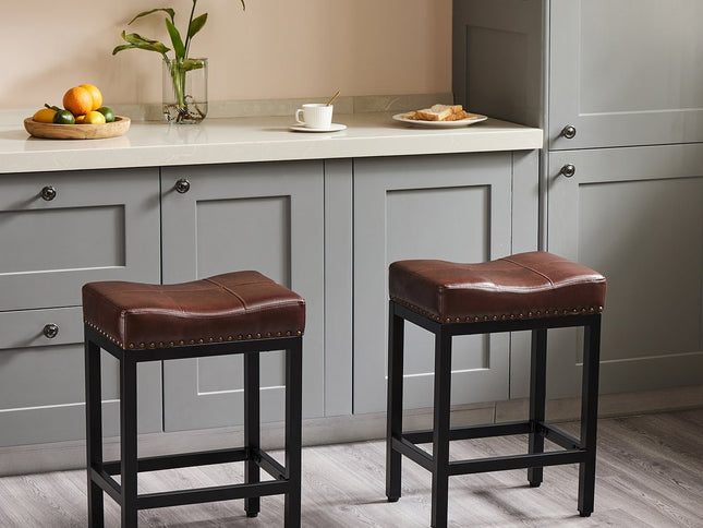 Set of Two 22" Black and Brown Upholstered and Heavy Duty Plastic Backless Bar Chairs