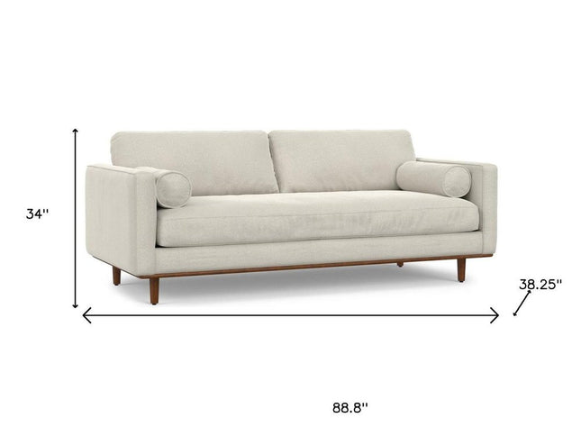 89" Cream Fabric Sofa With Brown Legs