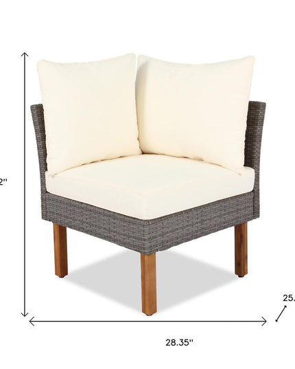 Nine Piece Gray and Beige Rattan Upholstered Cushions Sectional Seating Group With Table