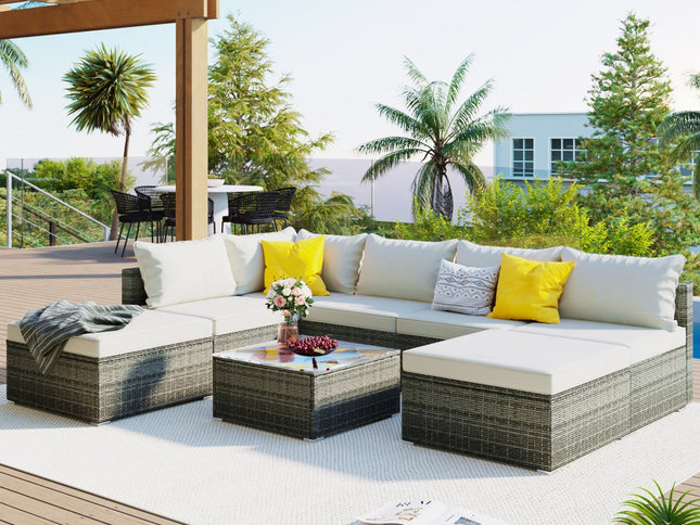 Eight Piece Gray and Beige Wicker Upholstered Cushions Sectional Seating Group With Table