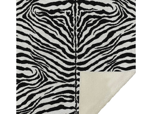 50" X 70" Black And Ivory Animal Print Polyester Woven Plush Throw Blanket