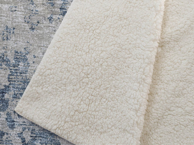 50" X 70" Blue Beige And Ivory Abstract Polyester Woven Plush Throw Blanket