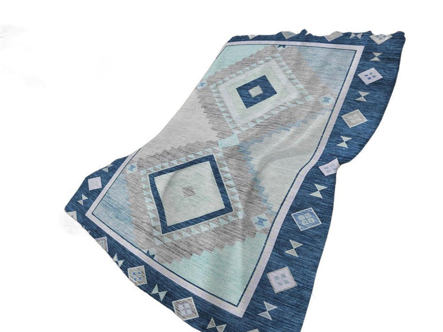 50" X 70" Blue And Ivory Geometric Polyester Woven Plush Throw Blanket