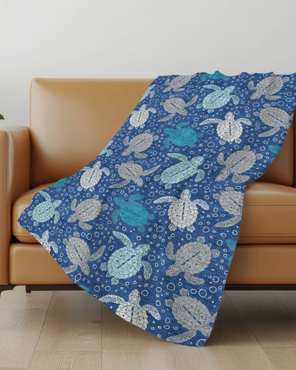 50" X 70" Blue Ivory And Teal Animal Print Polyester Woven Plush Throw Blanket