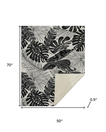 50" X 70" Midnight And Ivory Leaves Polyester Woven Plush Throw Blanket