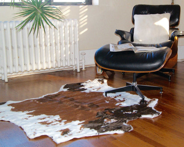 4' x 5' Faux Cow Hide Brown And White Area Rug