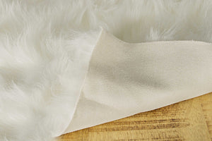 48" x 72" x 1.5" Off White Faux Sheepskin Area Rug