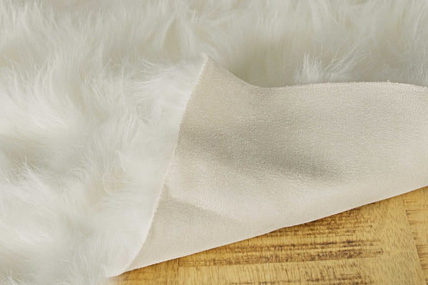 48" x 72" x 1.5" Off White Faux Sheepskin Area Rug