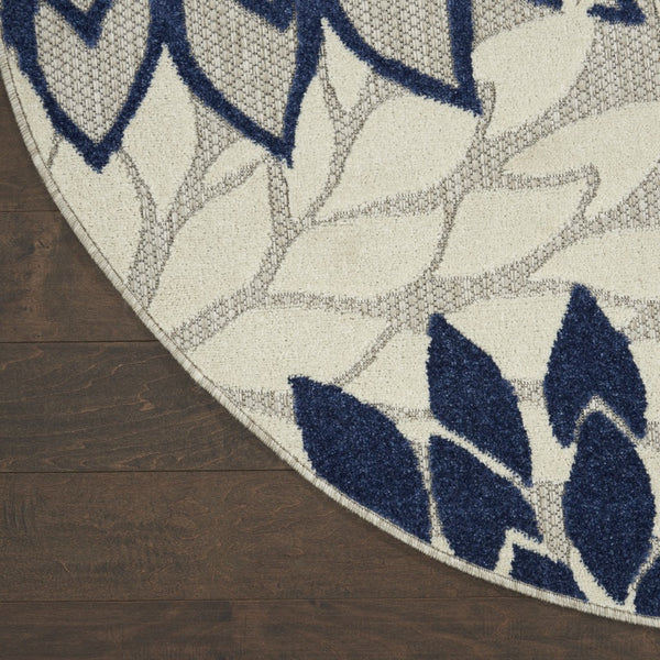 4’ Round Ivory and Navy Indoor Outdoor Area Rug