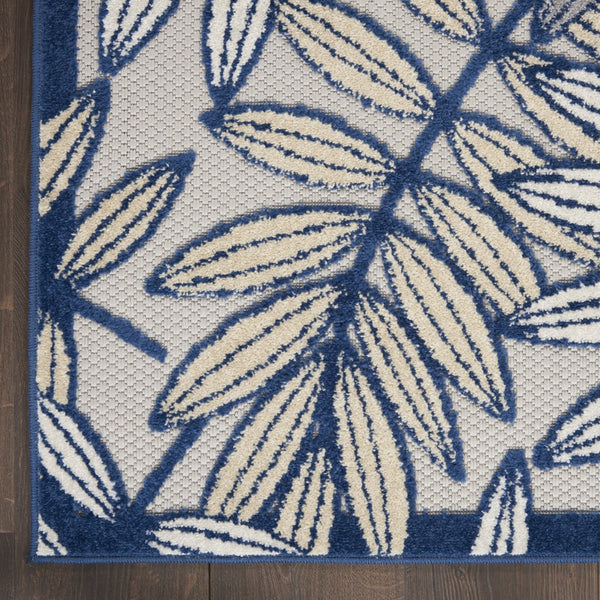 5’ x 7' Ivory and Navy Leaves Indoor Outdoor Area Rug