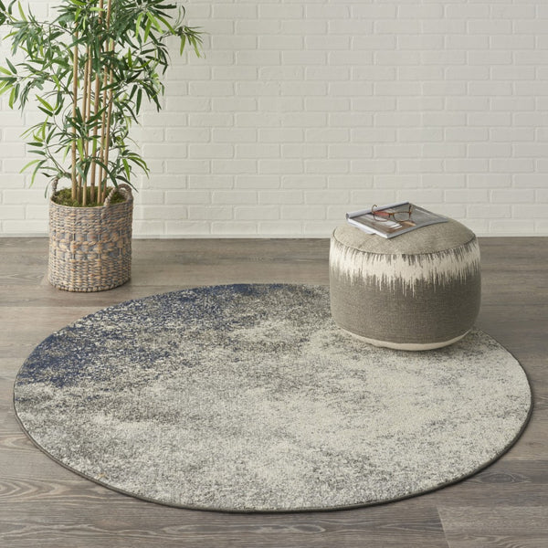 4’ Round Charcoal and Ivory Abstract Area Rug