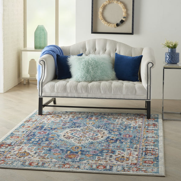 4’ x 6’ Ivory and Blue Floral Motifs Area Rug