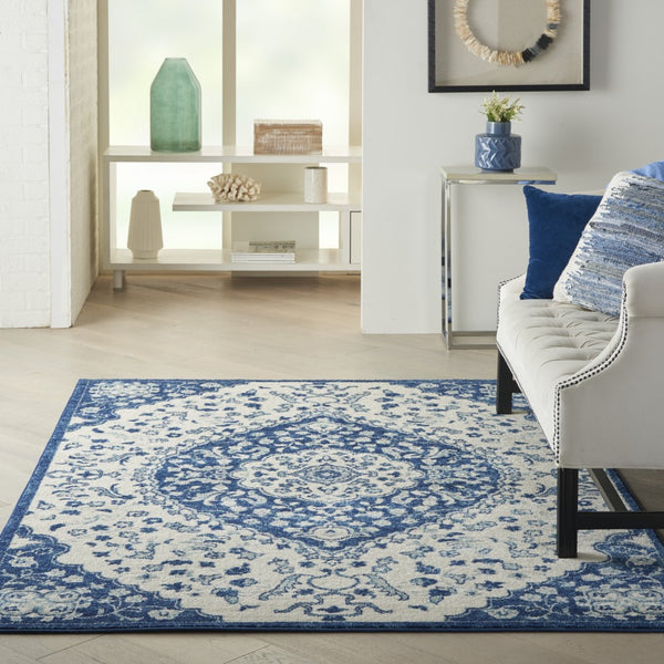 5’ x 7’ Ivory and Blue Medallion Area Rug