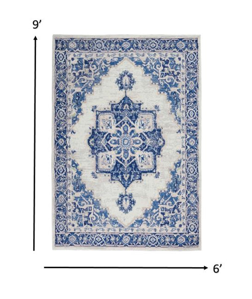 6’ x 9’ Ivory and Blue Persian Medallion Area Rug