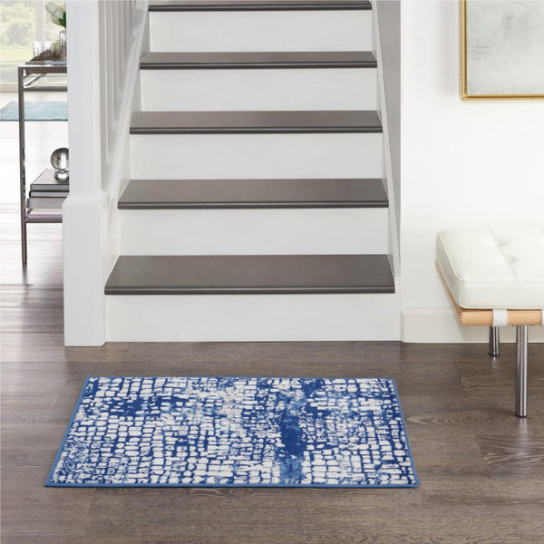 4’ x 6’ Ivory and Navy Abstract Grids Area Rug