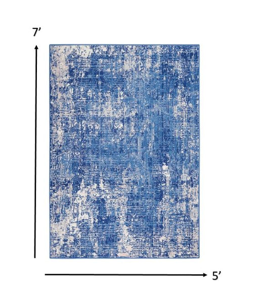 5’ x 7’ Blue and Ivory Abstract Splash Area Rug