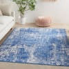 5’ x 7’ Blue and Ivory Abstract Splash Area Rug