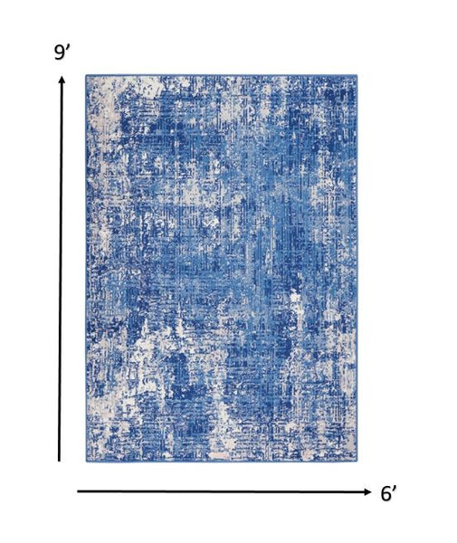 6’ x 9’ Blue and Ivory Abstract Splash Area Rug