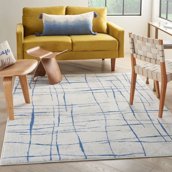 4’ x 6’ Ivory and Blue Irregular Grids Area Rug