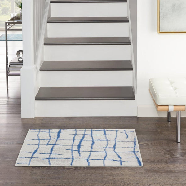 4’ x 6’ Ivory and Blue Irregular Grids Area Rug