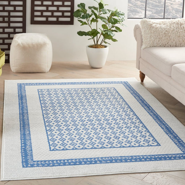 4’ x 6’ Ivory and Blue Geometric Area Rug