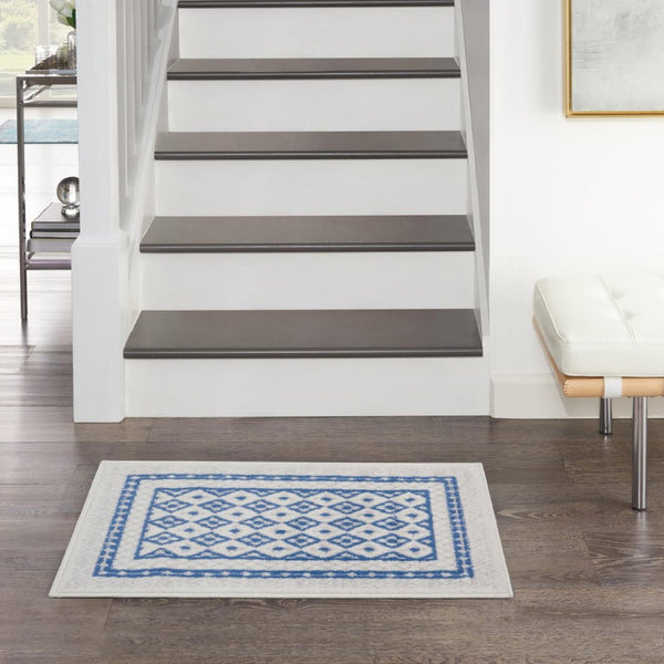 4’ x 6’ Ivory and Blue Geometric Area Rug