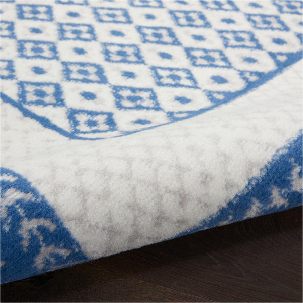 4’ x 6’ Ivory and Blue Geometric Area Rug