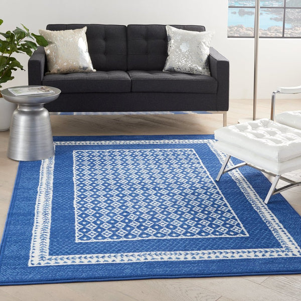 5’ x 7’ Navy and Ivory Geometric Area Rug