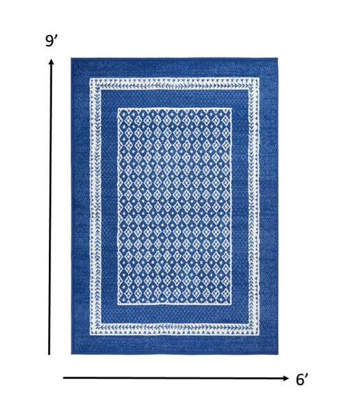 6’ x 9’ Navy and Ivory Geometric Area Rug