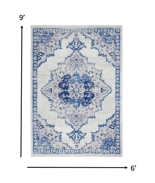 6’ x 9’ Ivory and Blue Medallion Area Rug