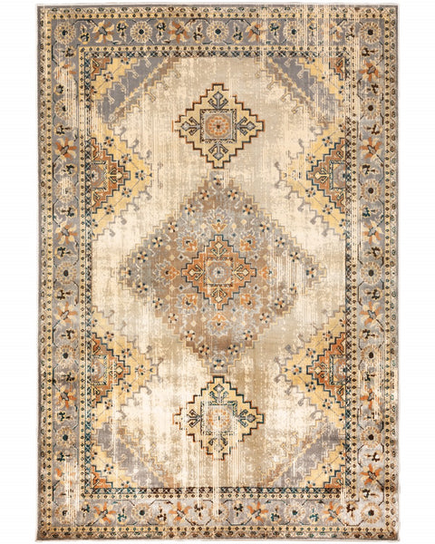 7’ x 9’ Gray and Beige Aztec Pattern Area Rug