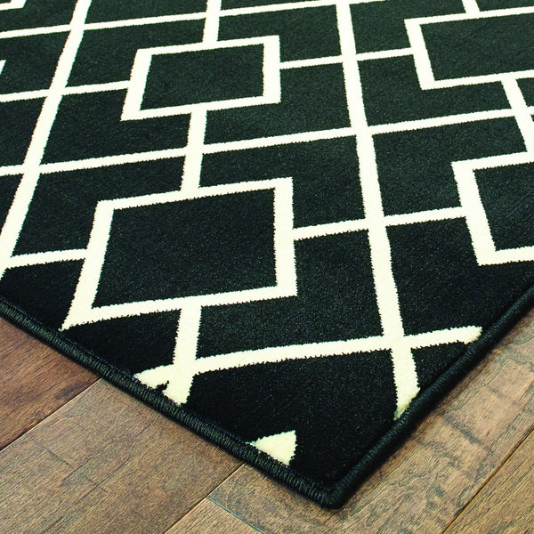 5' x 8' Black Ivory Machine Woven Geometric Diamonds Indoor Area Rug